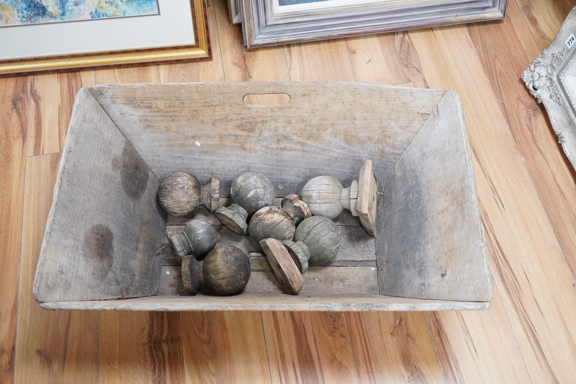 A wood dough bin and various wood finials, largest 77cm